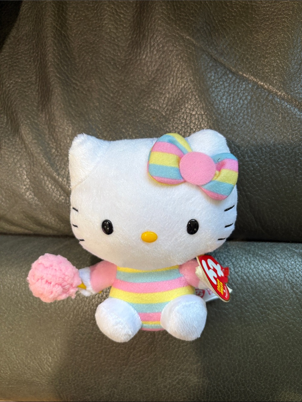 Hello kitty pastel stripe outfit with cotton candy plush